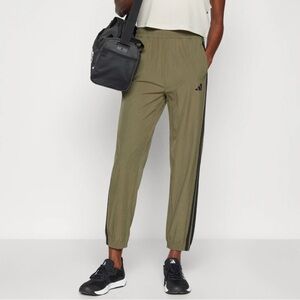 Adidas Women’s Train Essential Woven Pants in Olive Strata